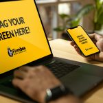 Mockup display on laptop and smartphone for design presentations in a modern workspace.